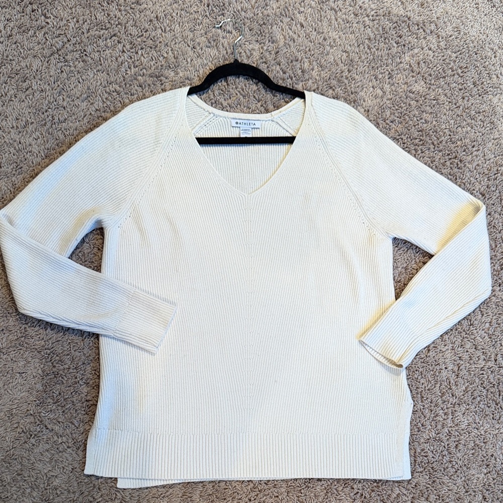 Athleta off-white long sleeve sweater V-neck slits at hip. Women’s size medium M